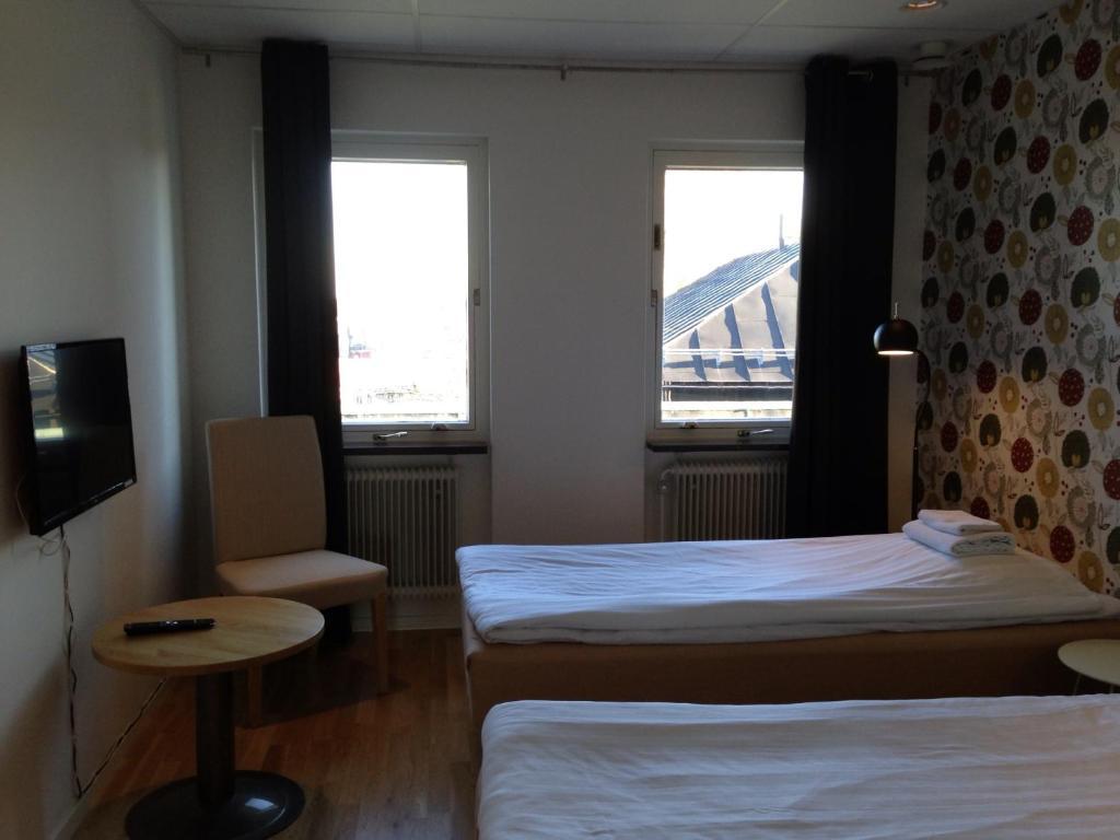 Vaesterbacken Hotell & Konferens Holmsund Quarto foto